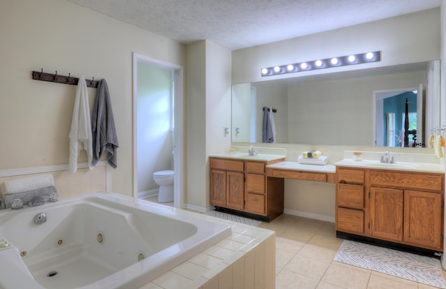 10895 Riley St, Zeeland, MI 49464 - full bath featuring double vanity, a tub with jets, tile patterned floors, and a textured ceiling
