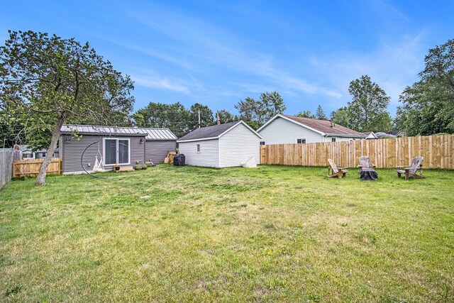 1118 Huntly Rd, Niles, MI 49120 - fenced backyard featuring an outdoor structure