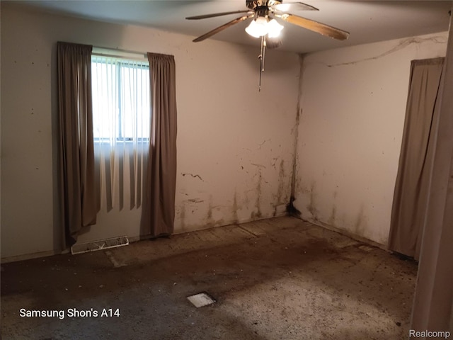3375 Jacque St, Flint, MI 48532 - empty room featuring ceiling fan