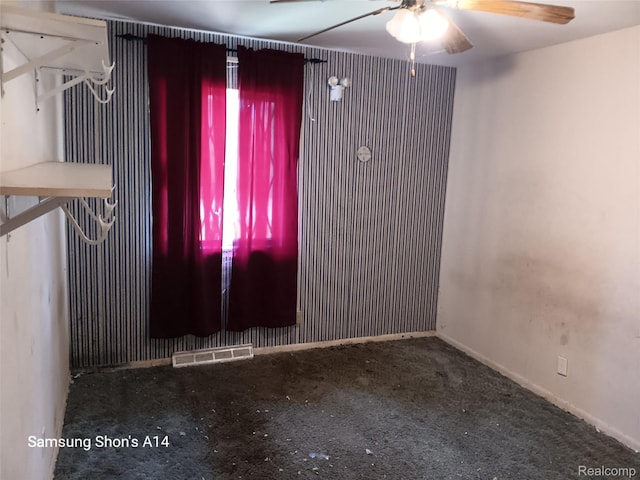 3375 Jacque St, Flint, MI 48532 - spare room with a ceiling fan and carpet flooring