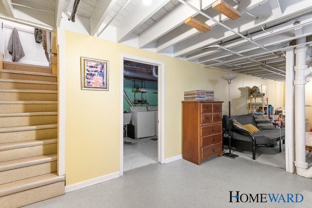 660 Deming St SE, Grand Rapids, MI 49507 - finished basement featuring washing machine and dryer and stairway
