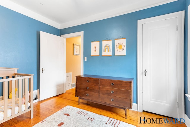 660 Deming St SE, Grand Rapids, MI 49507 - bedroom with wood finished floors