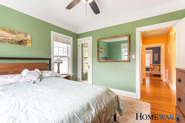 660 Deming St SE, Grand Rapids, MI 49507 - bedroom with wood finished floors and ceiling fan