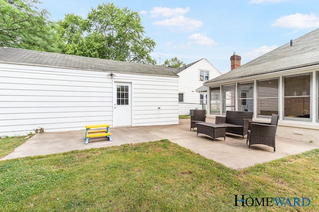 660 Deming St SE, Grand Rapids, MI 49507 - view of green lawn featuring a patio and an outdoor living space