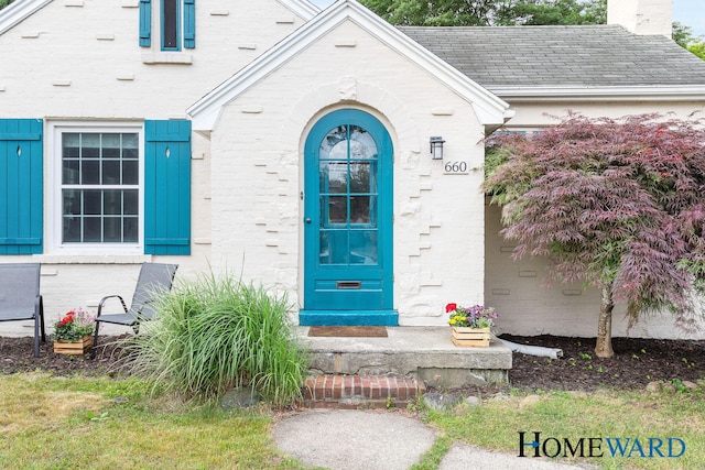 660 Deming St SE, Grand Rapids, MI 49507 - entrance to property with a chimney