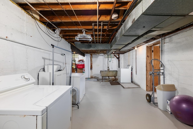 2013 Duiker Ave NE, Grand Rapids, MI 49505 - unfinished below grade area featuring washing machine and dryer and a sink