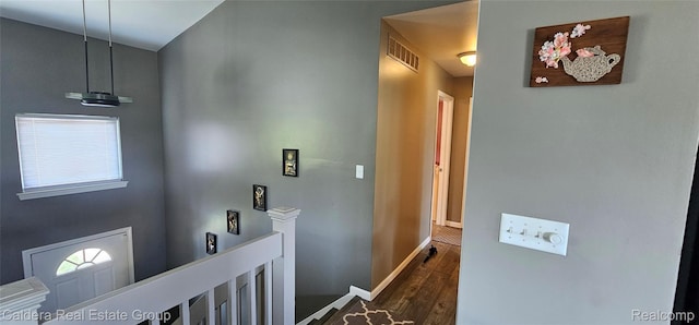 38478 Draper Ln, Westland, MI 48186 - hallway featuring an upstairs landing, dark wood-style flooring, and plenty of natural light