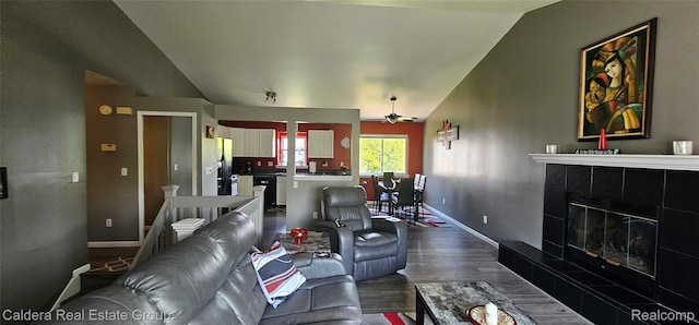 38478 Draper Ln, Westland, MI 48186 - living area featuring lofted ceiling, dark wood finished floors, a fireplace, and ceiling fan