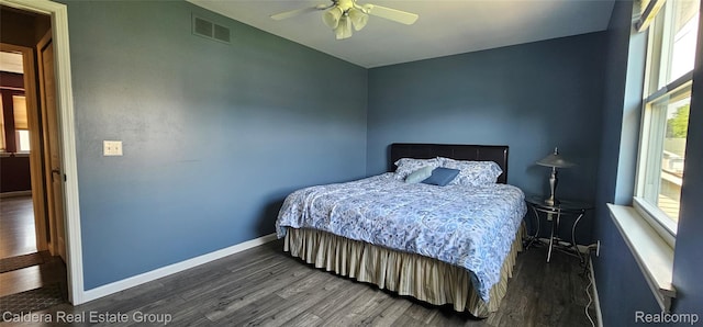 38478 Draper Ln, Westland, MI 48186 - bedroom with wood finished floors, multiple windows, and ceiling fan