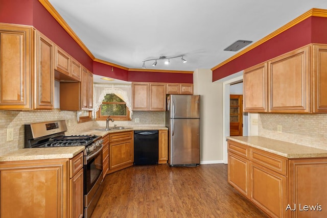 2155 Lake Michigan Dr NW, Grand Rapids, MI 49504 - kitchen with appliances with stainless steel finishes, dark wood finished floors, tasteful backsplash, and ornamental molding