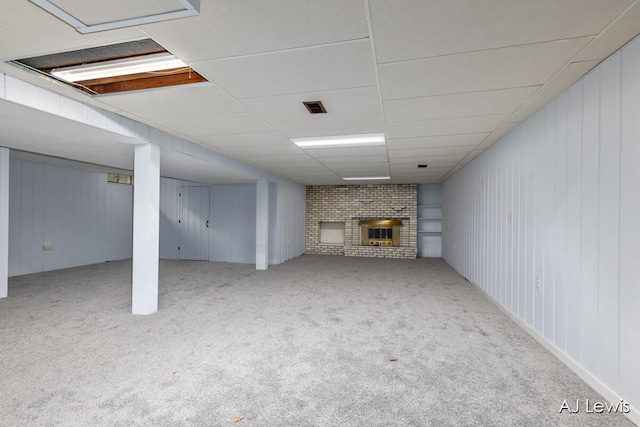 2155 Lake Michigan Dr NW, Grand Rapids, MI 49504 - finished basement with a fireplace and carpet
