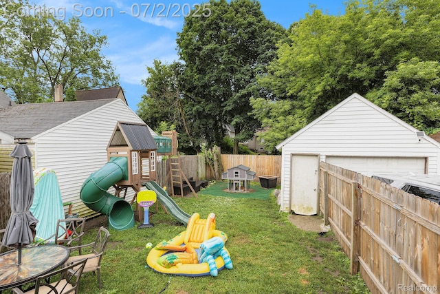 1323 Rhodes St, Jackson, MI 49202 - fenced backyard featuring a playground and an outdoor structure