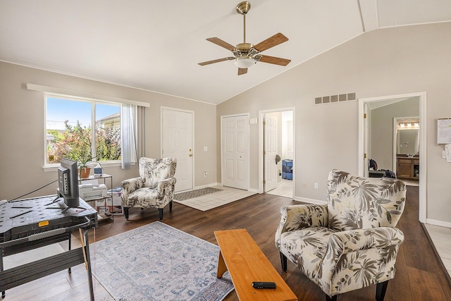 46317 Dequindre Rd, Rochester Hills, MI 48307 - living room featuring a ceiling fan, wood finished floors, and high vaulted ceiling