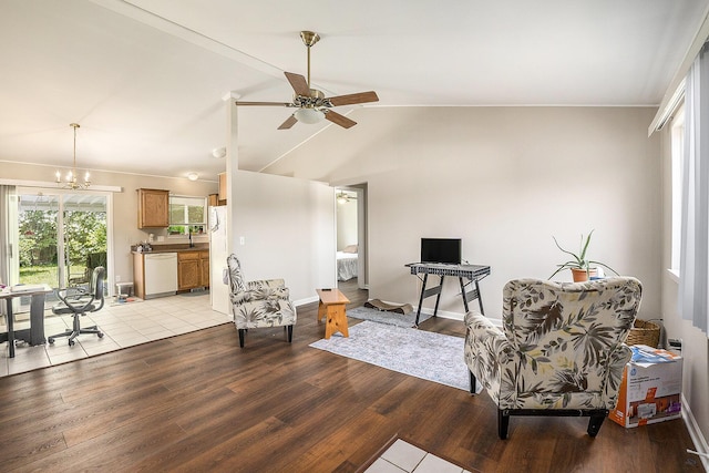 46317 Dequindre Rd, Rochester Hills, MI 48307 - living area with light wood-style floors, a chandelier, vaulted ceiling, and a ceiling fan