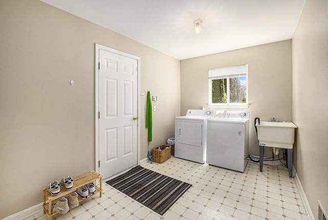 46317 Dequindre Rd, Rochester Hills, MI 48307 - laundry room featuring washing machine and clothes dryer and light flooring