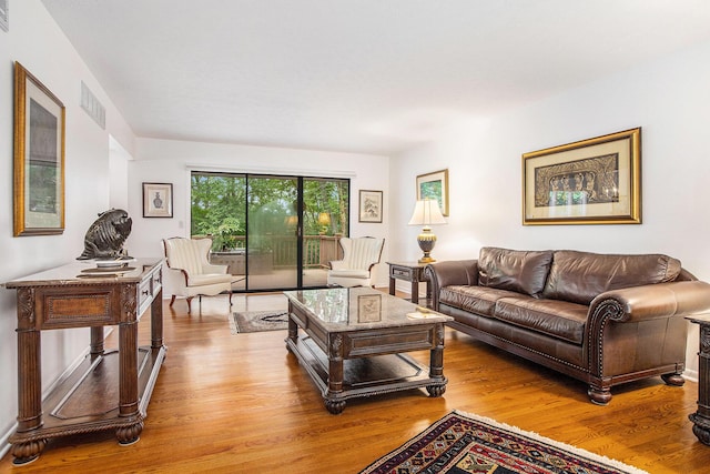 3924 Penberton Dr, Ann Arbor, MI 48105 - living room featuring wood finished floors