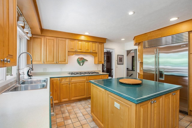 3924 Penberton Dr, Ann Arbor, MI 48105 - kitchen with appliances with stainless steel finishes, recessed lighting, a kitchen island, and dark countertops