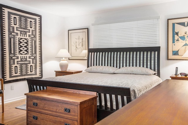 3924 Penberton Dr, Ann Arbor, MI 48105 - bedroom with wood finished floors and baseboards