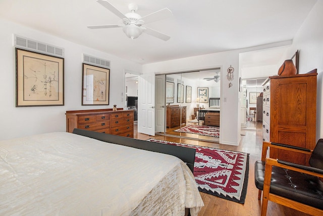 3924 Penberton Dr, Ann Arbor, MI 48105 - bedroom featuring wood finished floors, ceiling fan, and a closet
