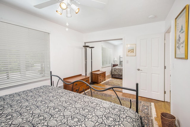 3924 Penberton Dr, Ann Arbor, MI 48105 - bedroom with wood finished floors, a ceiling fan, and a closet