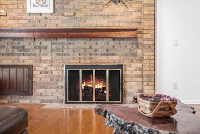3924 Penberton Dr, Ann Arbor, MI 48105 - detailed view of wood finished floors and a fireplace