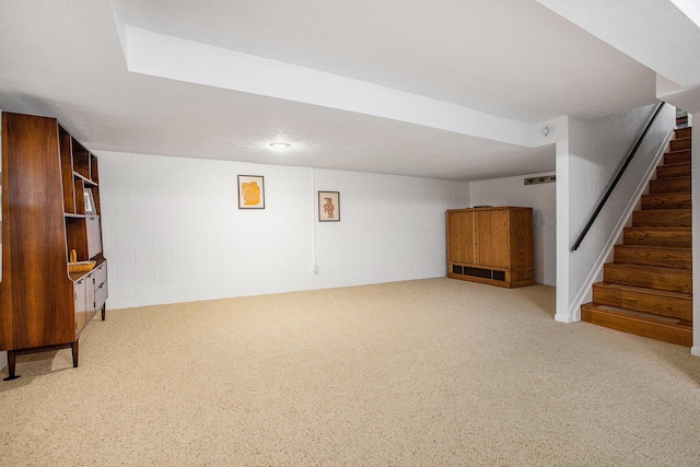 3924 Penberton Dr, Ann Arbor, MI 48105 - finished basement with carpet flooring, stairway, and concrete block wall