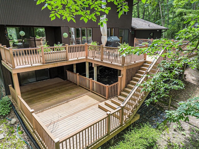 3924 Penberton Dr, Ann Arbor, MI 48105 - wooden deck with stairs and area for grilling