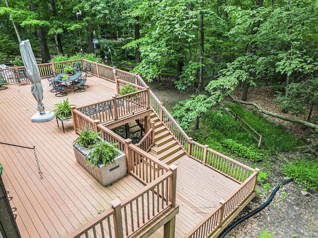 3924 Penberton Dr, Ann Arbor, MI 48105 - wooden deck featuring outdoor dining area and stairs