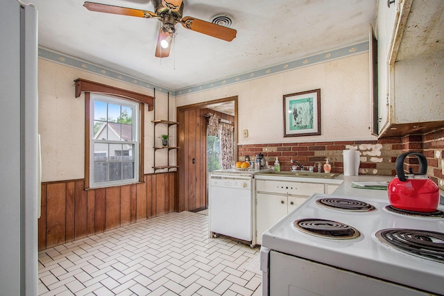 1209 Mohawk Ln, Saint Joseph, MI 49085 - kitchen featuring white appliances, light countertops, brick patterned flooring, ceiling fan, and white cabinets