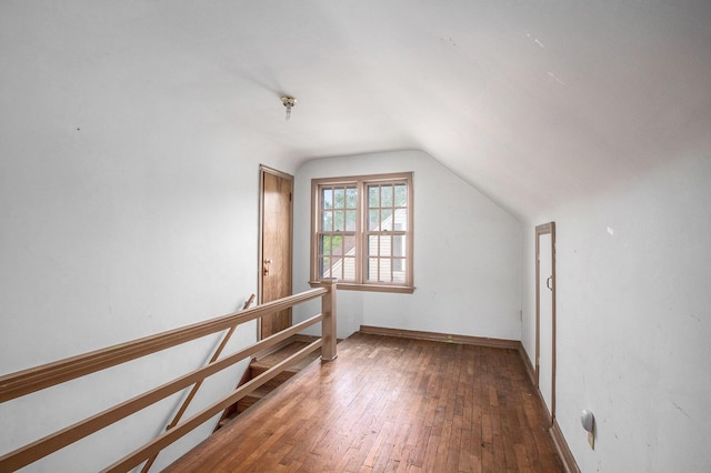 1209 Mohawk Ln, Saint Joseph, MI 49085 - bonus room with vaulted ceiling and hardwood / wood-style flooring