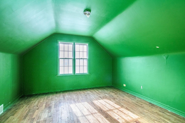 1209 Mohawk Ln, Saint Joseph, MI 49085 - bonus room featuring wood-type flooring and vaulted ceiling