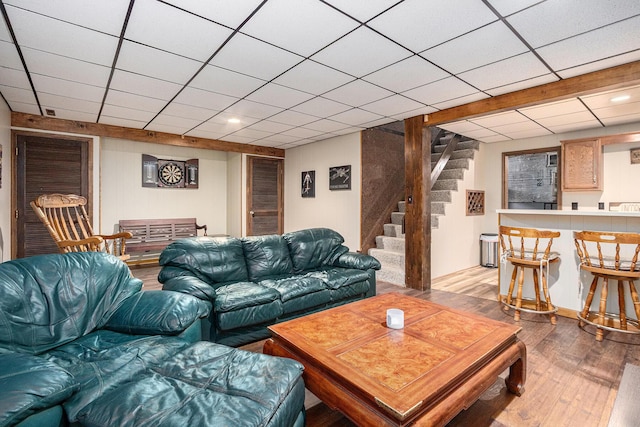 4102 Tomahawk Way, Saint Joseph, MI 49085 - living area featuring stairs, light wood-type flooring, and a paneled ceiling
