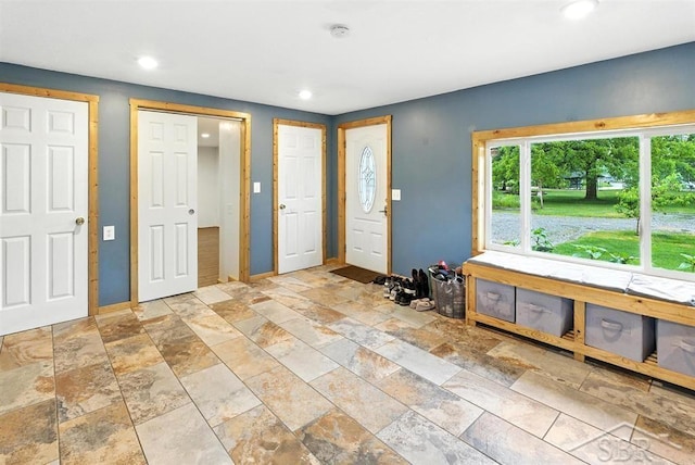 534 S Main St, Au Gres, MI 48703 - entrance foyer with recessed lighting and stone tile flooring