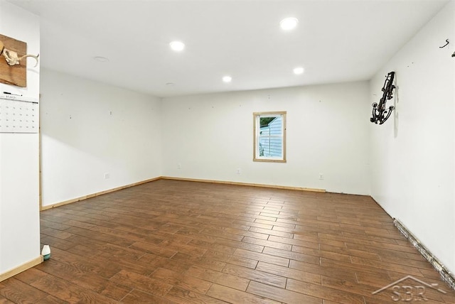 534 S Main St, Au Gres, MI 48703 - spare room with hardwood / wood-style floors and recessed lighting