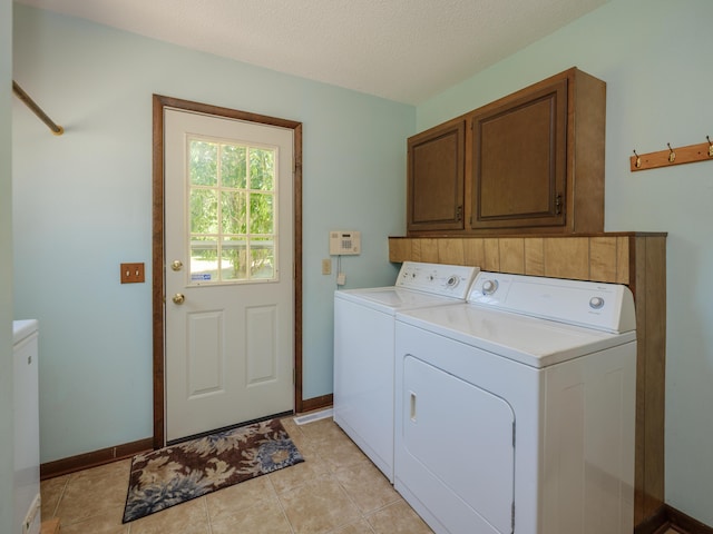 461 19th St, Otsego, MI 49078 - washroom with independent washer and dryer and cabinet space