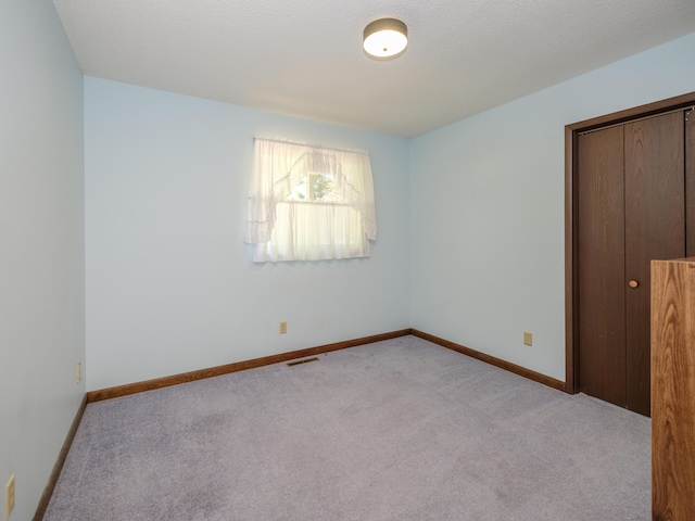 461 19th St, Otsego, MI 49078 - unfurnished bedroom with carpet flooring and a closet