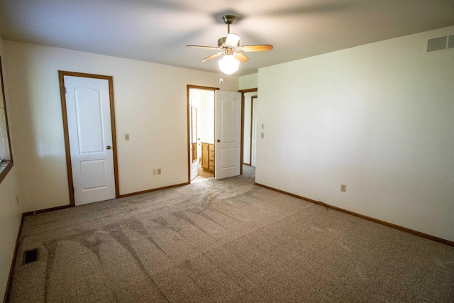 5546 Hickory Cir, Flushing, MI 48433 - unfurnished bedroom featuring light colored carpet, ceiling fan, and ensuite bath