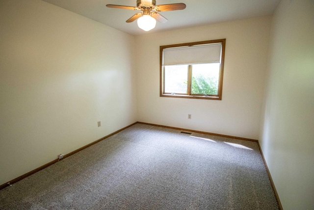 5546 Hickory Cir, Flushing, MI 48433 - spare room featuring carpet flooring and ceiling fan