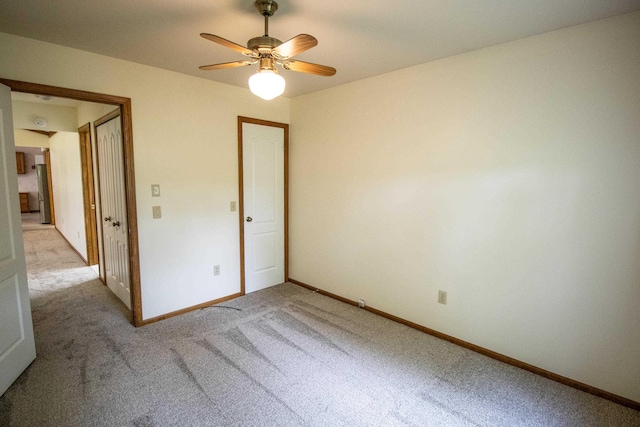 5546 Hickory Cir, Flushing, MI 48433 - unfurnished bedroom with light carpet and ceiling fan