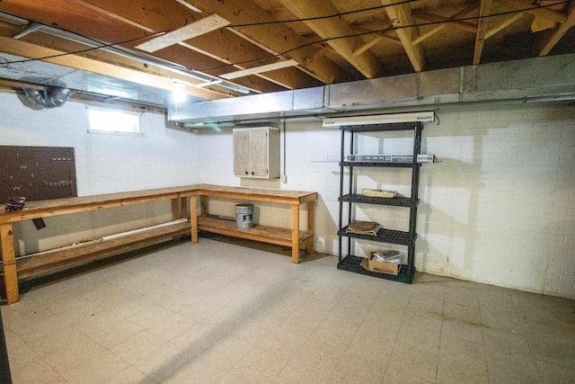 5546 Hickory Cir, Flushing, MI 48433 - below grade area with light floors and brick wall