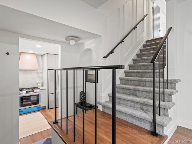 3025 Clawson Ave, Royal Oak, MI 48073 - stairway featuring wood finished floors and baseboards