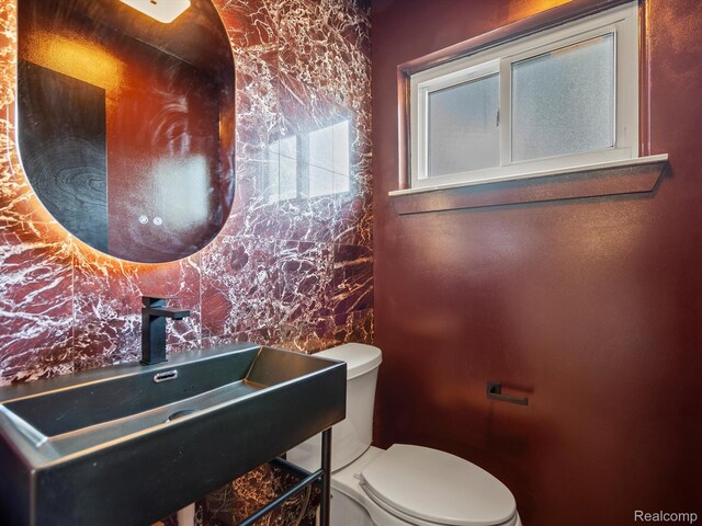 3025 Clawson Ave, Royal Oak, MI 48073 - bathroom with toilet and tile walls
