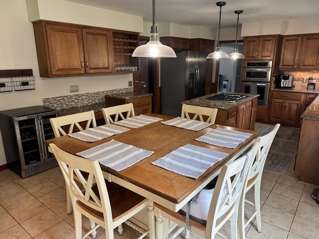 472 Ashton Ct SE, Grand Rapids, MI 49546 - dining room featuring wine cooler and light tile patterned flooring