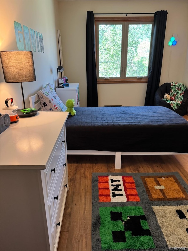 472 Ashton Ct SE, Grand Rapids, MI 49546 - bedroom with wood finished floors