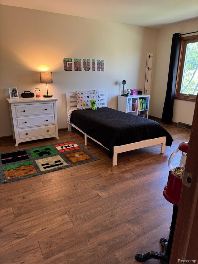 472 Ashton Ct SE, Grand Rapids, MI 49546 - bedroom featuring wood finished floors