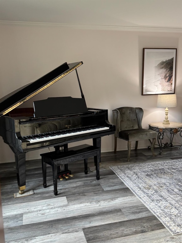 472 Ashton Ct SE, Grand Rapids, MI 49546 - sitting room with crown molding and wood finished floors