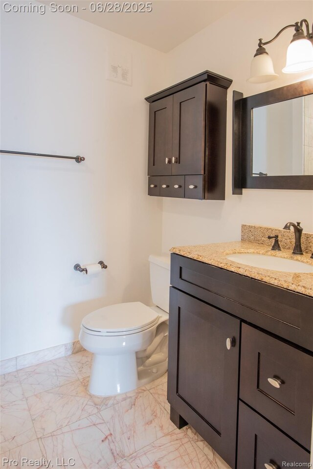 3559 Port Cove Dr Unit 25, Waterford, MI 48328 - half bathroom featuring marble finish floors and vanity