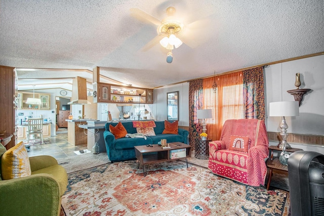 1950 S 13th, Niles, MI 49120 - living room with a textured ceiling, crown molding, a ceiling fan, and lofted ceiling