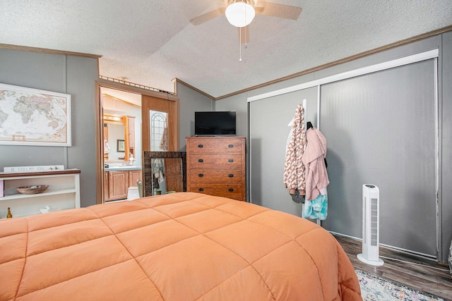 1950 S 13th, Niles, MI 49120 - bedroom with ornamental molding, a textured ceiling, wood finished floors, vaulted ceiling, and ceiling fan