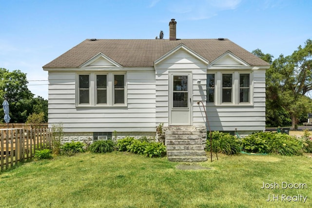 1802 Cherry St, Dorr, MI 49323 - bungalow-style home with entry steps and roof with shingles